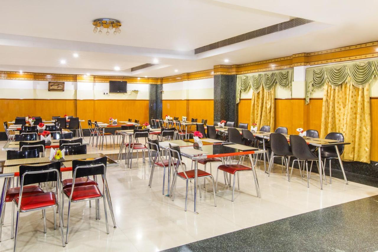 Capital O 69831 Hotel Mount Heera Madras Buitenkant foto